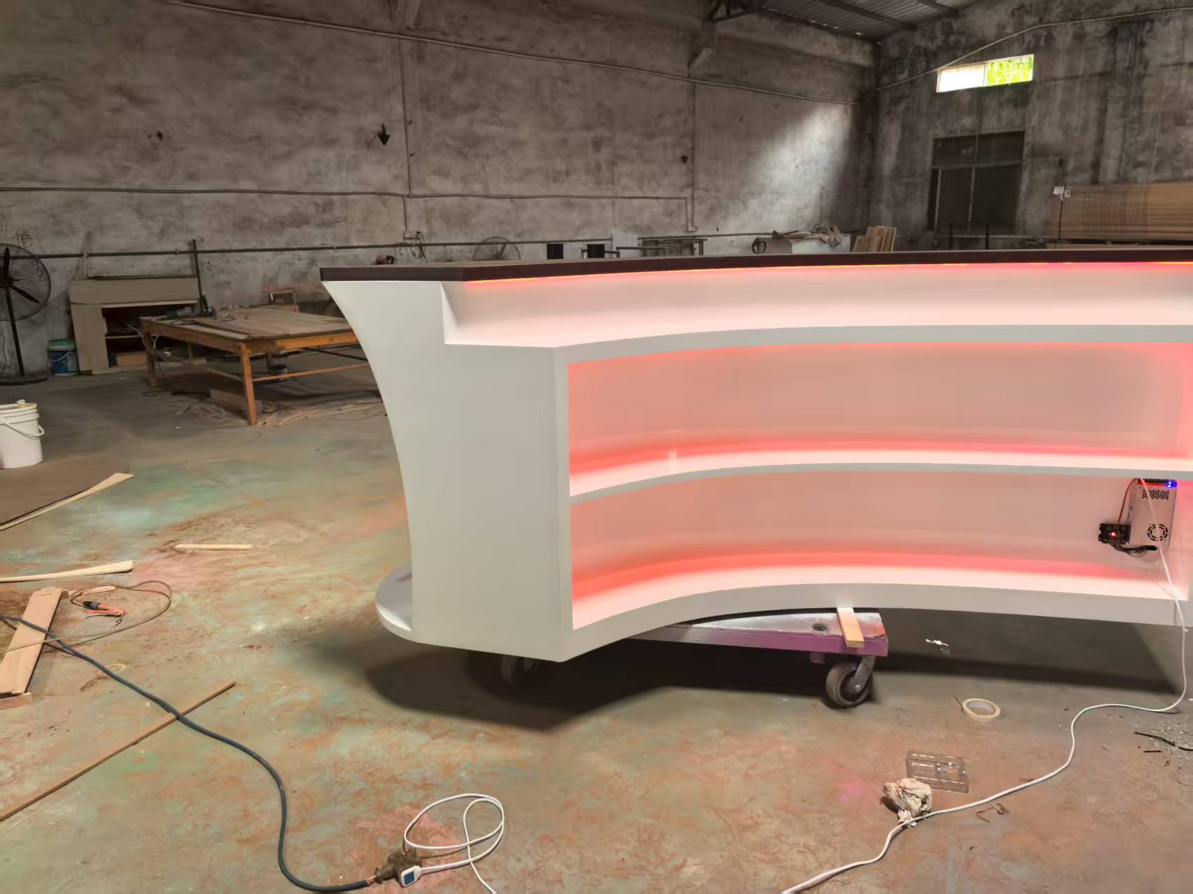 Illuminated cocktail bar table Corian artificial stone boat-shaped bar
