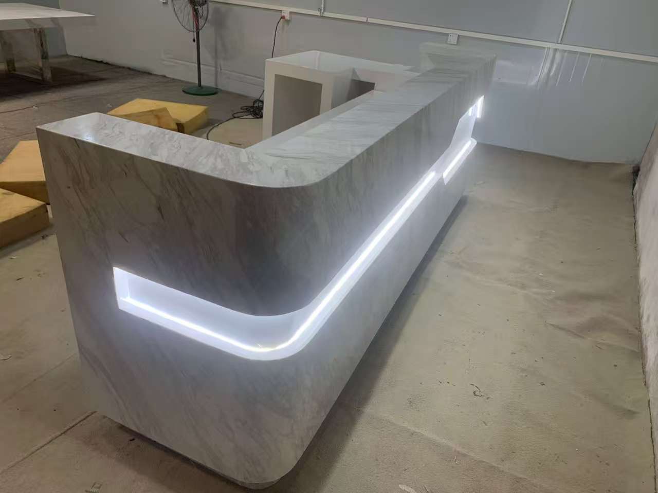 ADA compliant solid surface quartz lighted reception desk