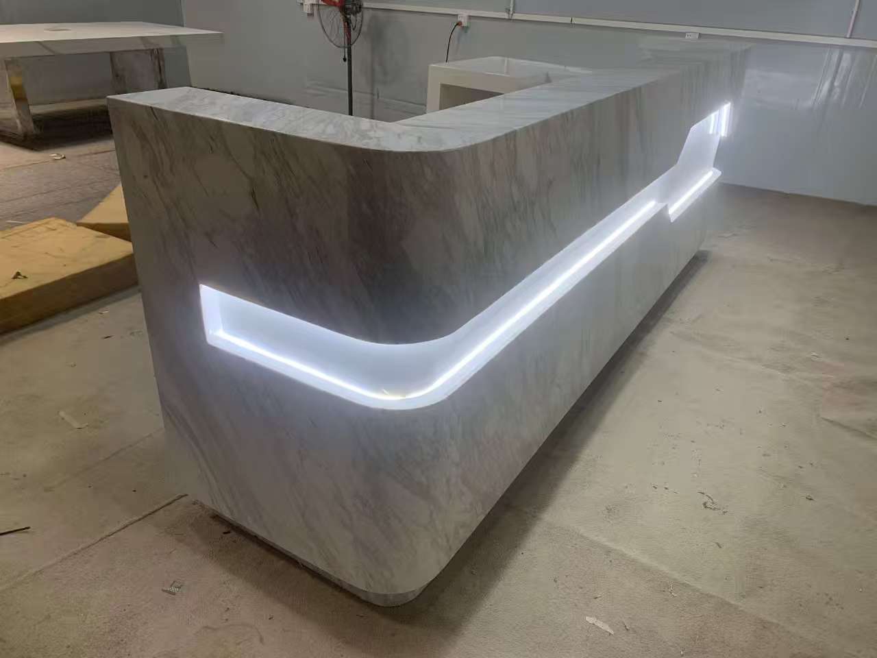ADA compliant solid surface quartz lighted reception desk