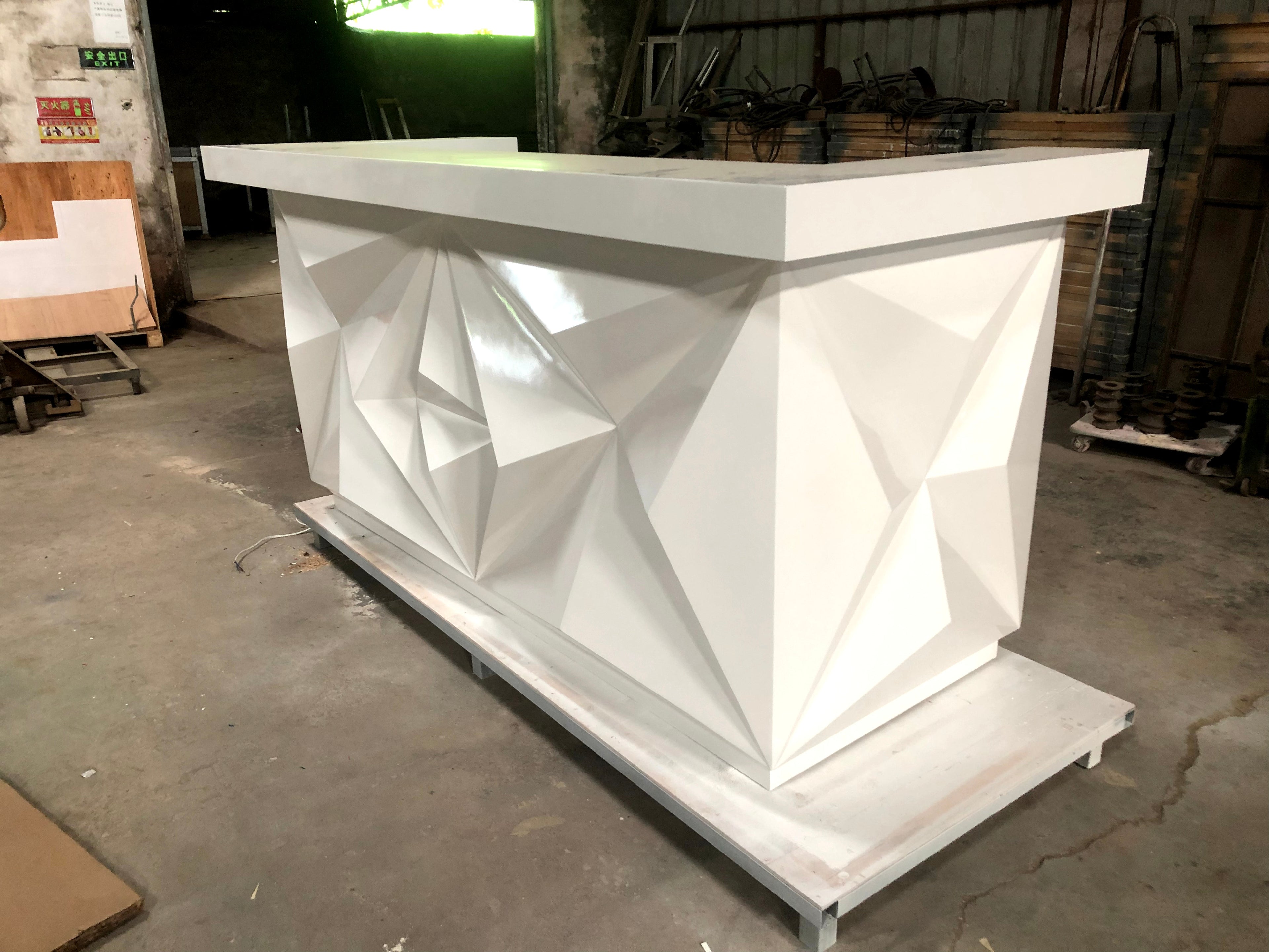 Small diamond-shaped reception desk